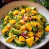 Avocado mango and arugula with lime dressing