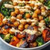 Roasted vegetable and chickpea bowl with maple Dijon tahini dressing
